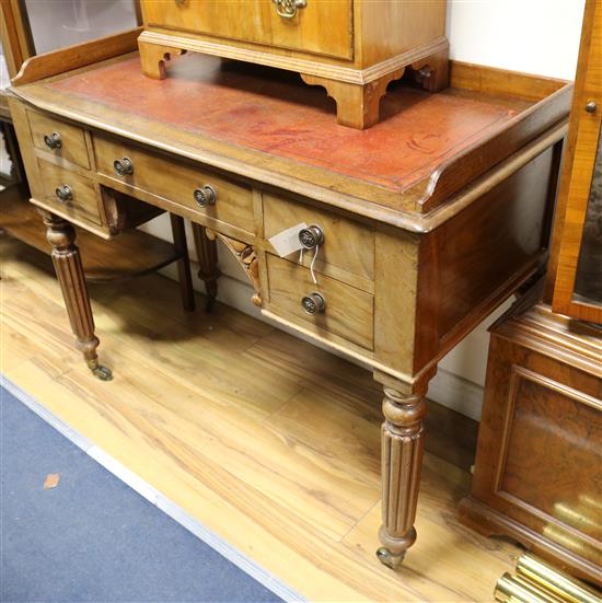 A Victorian mahogany writing table W.105cm